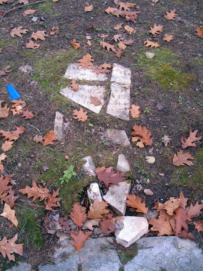 A before photo of the shattered headstone of Hester House, daughter of John and Abigail, who died in 1842 at the age of 16.