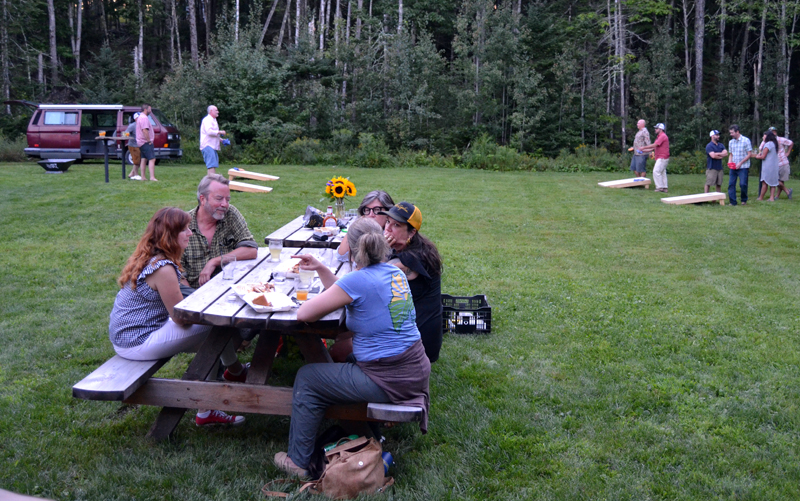 The Tin Top Cider Co. tasting room offers plenty of outdoors seating and yard games, such as cornhole. (Maia Zewert photo)