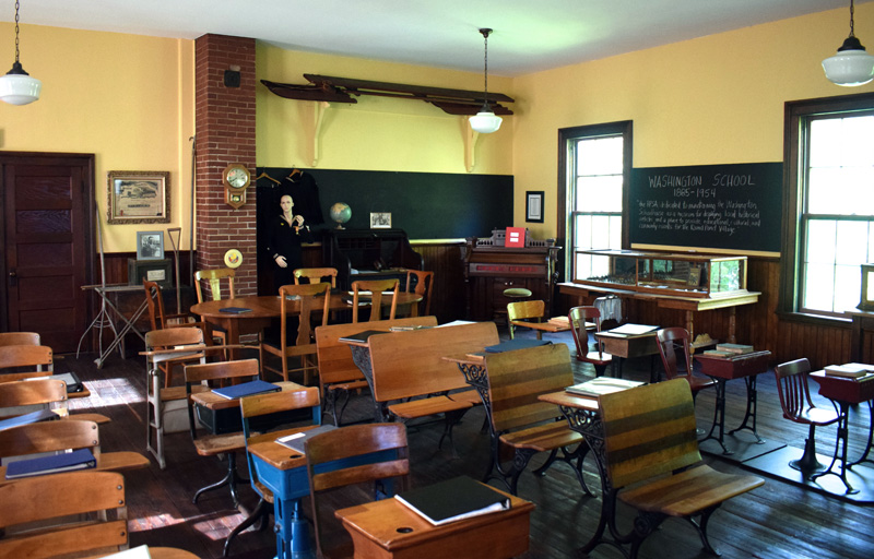 The interior of the second floor of the Washington School in Round Pond has been restored by the Round Pond Schoolhouse Association as a museum that replicates a classroom in the historic 1885 building. William "Bill" Smith, who attended the school from 1938 to 1946, was one of the founding members of the nonprofit and still gives tours of the school today. (Evan Houk photo)