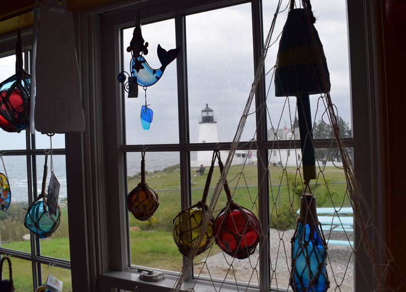 Pemaquid Point Lighthouse can be seen through the window of newly constructed SeaGull Gift Shop and Restaurant. Co-owner Brooke Cotter said that the gift shop has all of the old inventory as well as some "new fun stuff." (Evan Houk photo)