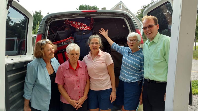 Mariellen Whelan (second from right) with a group of volunteers from the Second Congregational Church in Newcastle who transported trucks and vans full of clothing to Portland to help support immigrants rapidly entering the area. (Photo courtesy Mariellen Whelan)