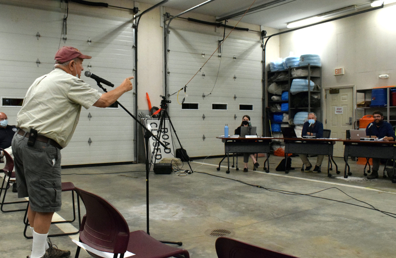 Newcastle resident Norman Hunt demands an answer to a question from the Newcastle Board of Selectmen during a meeting concerning Newcastle's Taniscot Engine Co. on Monday, Sept. 13. The meeting was attended by nearly 40 people and grew contentious at times. (Evan Houk photo)