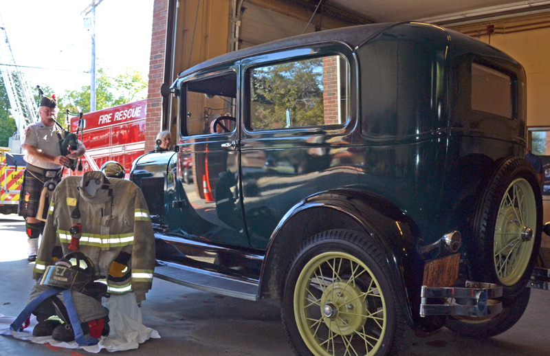 The pullout gear of the late Peter Rines was displayed next to his antique car during the Celebration of his life, held at the Wiscasset Fire Station, September 19, while David McLean played Amazing Grace on the bagpipe.  (Charlotte Boynton photo)