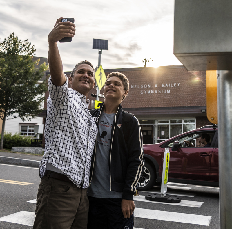 Jayden brown, 14, and father Ben take a back to school selfie before attending freshman and sophomore orientation at Lincoln Academy in Newcastle on Monday. Sept. 1. (Bisi Cameron Yee photo)