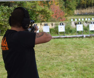 Conner Yurko, of Wiscasset, sites in a target during the first Project Appleseed event held in Midcoast Maine, at the Lincoln County Rifle Club in Damariscotta on Oct. 9. Yurko works at Atlantic Motorcar Center in Wiscasset and attended the event with seven of his co-workers and owner of the business, Bruce Howes. (Evan Houk photo)