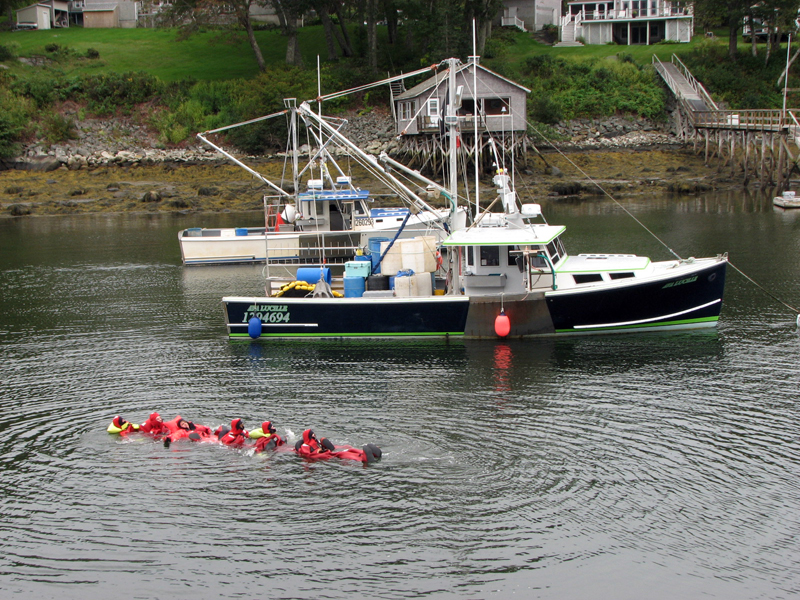 The survival swimming chain passing the F/V Ava Lucille resting on its mooring in New Harbor. (Courtesy photo)