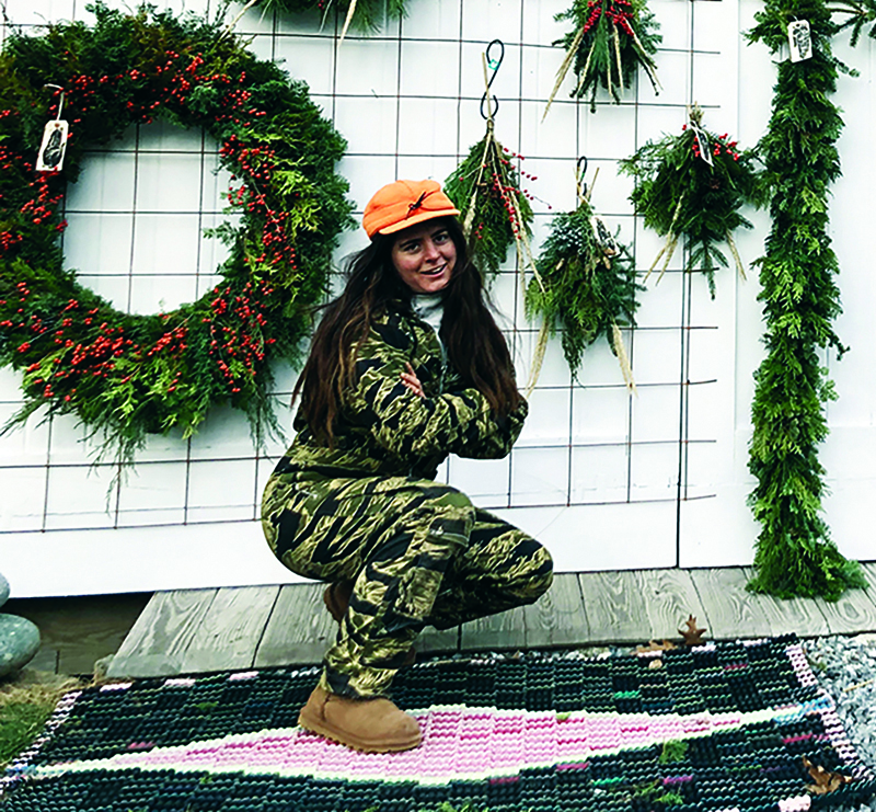 Rachel Alexandrou poses with her wreaths at The Good Supply. (Courtesy photo)