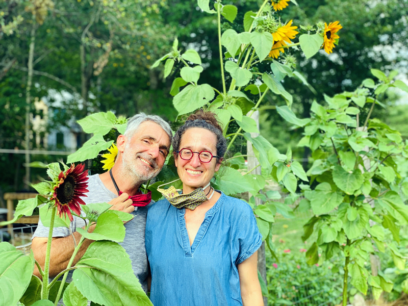 Alain Ollier and Erica Berman in one of their Veggies to Table gardens in Newcastle. (Photo courtesy Caroline Mardok)