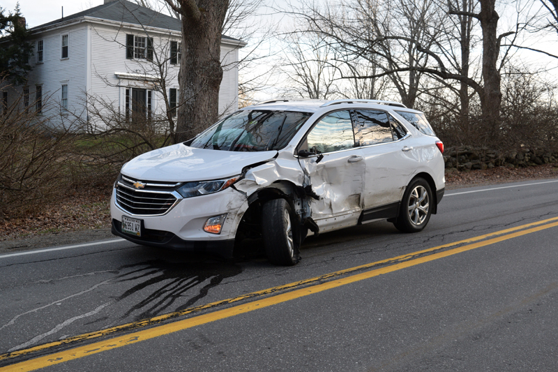 A 2018 Chevy Equinox sits in the northbound lane on River Road just past Glidden Cemetery in Newcastle following a two-vehicle collision on the afternoon of Dec. 13. (Nate Poole photo)