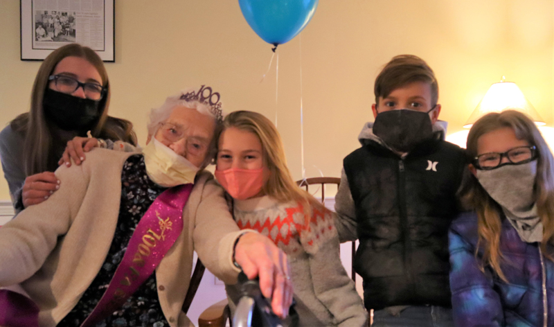 Eleanor Smith of Waldoboro poses with four of her great-grandchildren on her 100th birthday on Dec. 18. (Emily Hayes photo)