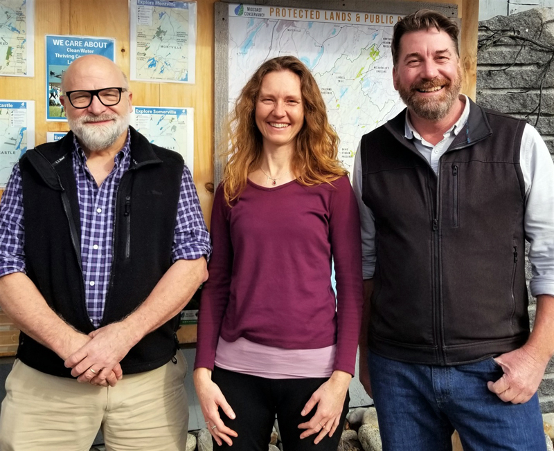 From left: Luther Black, Midcoast Conservancy Land Protection Specialist Anna Fiedler, and Executive Director Pete Nichols pose for a photo. Black recently gifted the Goose River Woodland Preserve to Midcoast Conservancy in honor of his family. (Courtesy photo)
