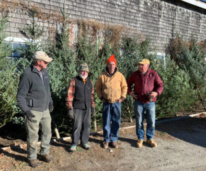 Arrival of Christmas trees at Sheepscot General Store with proceeds to benefit the Whitefield Library. Geezers Santas from left to right are Dennis Merrill, Mike McMorrow, Erik Ekholm, and Dan Joslyn. The trees were generously donated by Louie and Kathy Sell. (Photo courtesy Cheryle Joslyn)