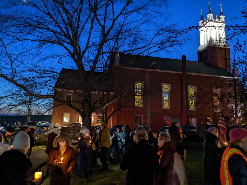 A large group of Lincoln County residents gathered at the Veterans Park in Newcastle on the evening of Jan. 6 to hold a vigil on the anniversary of last year's U.S. Capitol attack. (Nate Poole photo)