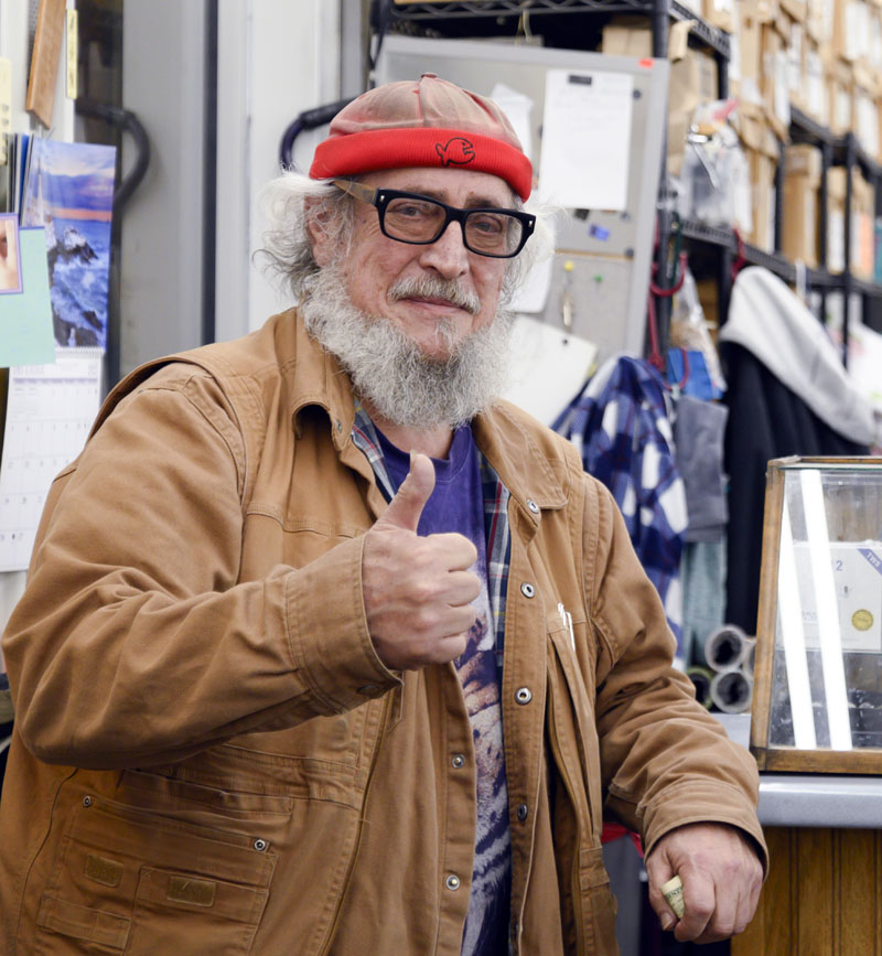 Al Cohen gives a thumbs up at the end of the day at Big Al's in Wiscasset on Dec. 30. Cohen remains an active owner, even through the closing days of the business he built. (Bisi Cameron Yee photo)