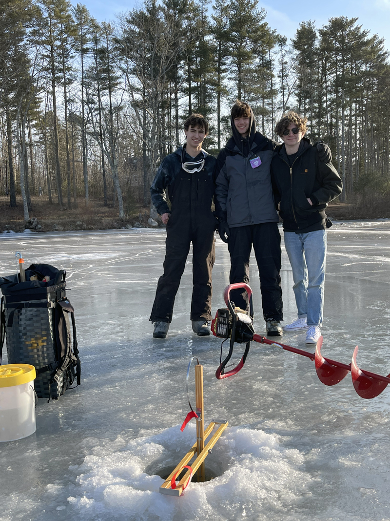 For left: Local teens Alex Gutierrez, Jack Lee, and Waylon Strout take a break from ice-fishing duties. (Photo courtesy Matthew Hanly)