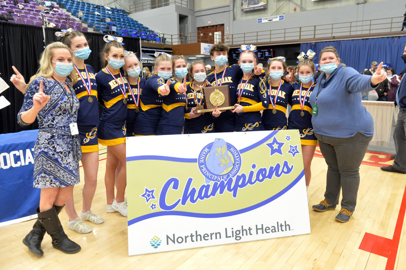 The Medomak Valley Panthers, the 2022 Maine State Class B cheering champions, flash the number one sign after winning on Feb. 12. From left: Assistant coach Rachel Coor, Sami Richardson, Alyssa Grindle, Aaliyah Thompson, Skylah Ward, Lizzi Swan, Emily Mahoney, Greg Cifaldo, Chloe Achorn, Hope Mason, Braelyn Hood, and coach Heather Simmons. (Paula Roberts photo)