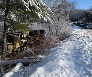 There were no injuries in a dump truck rollover at the intersection of Alna Road and Sheepscot Road in Alna on the morning of March 2. (Nate Poole photo)