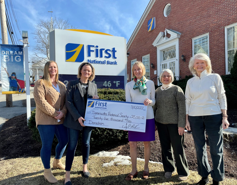 (From left) First National Bank Damariscotta Branch Manager Jessica Day and Business Development Officer Alyssa Allen present a check for $25,000 to Damariscotta Historical Society President Valeria Seibel, Treasurer Martha Dodge, and Planning Committee member Sally Beaudette. (Photo courtesy Valerie Seibel)