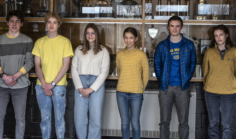 From left: Jonas Stepanauskas, Michal Maciejewicu, Flora Angyal, Audrey Hufnagel, Will Sherrill, and Marina McManus stand for a photo at Lincoln Academy in Newcastle on March 4. The six students helped focus attention on the plight of Ukraine by ringing the Lincoln Academy bell in recognition of those affected by the conflict and by sharing information on Ukraine during a school assembly. (Bisi Cameron Yee photo)