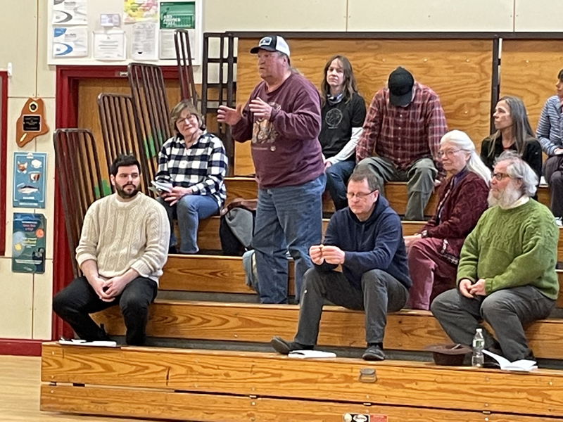 Ellis Percy, of Jefferson, speaks about the solar project he plans to develop on his property in Whitefield during the annual town meeting at Whitefield Elementary School on March 19. Article 51 proposed a moratorium on such projects, but ultimately failed by a majority vote, allowing Percys project to move forward. (Raye S. Leonard photo)