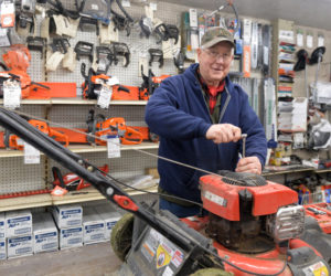 Dick Chadwick at work in his Nobleboro shop. Chadwick will hang up his wrenches at Chadwick's Power Products on March 31 after 45 years in business. (Paula Roberts photo)