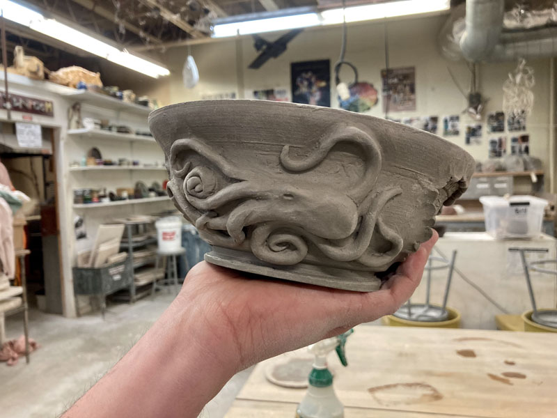 An LA ceramics student shows off their sculpted octopus bowl. Student ceramics pieces will be on display at the LA student art show. (Photo courtesy Jenny Mayher)