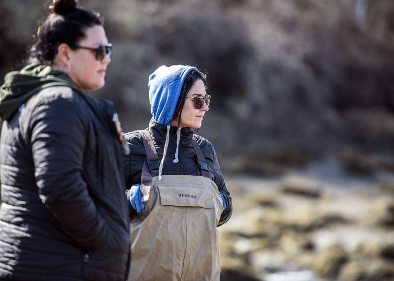 A pair of tribal fisherwomen await the opening of elver season in Bristol on March 22. Members of the Passamaquoddy tribe each have an individual quota of five pounds so getting an early start ups the odds of making their quota before the tribe quota is filled. (Bisi Cameron Yee photo)