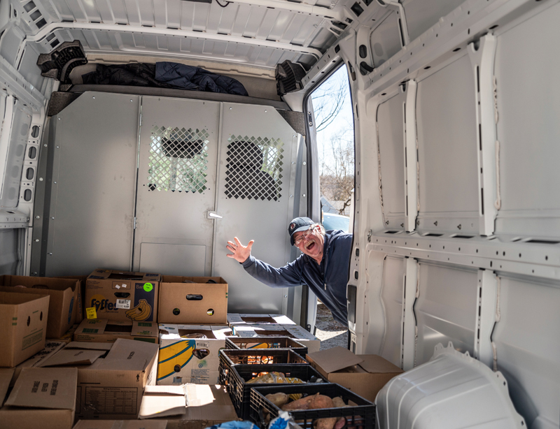 Lenny Ryan waves through the cargo door of the Waldoboro Food Pantry’s spacious new van in Waldoboro on April 4. The van will be used to pick up food from the Good Shepherd Food Bank and Hannaford Supermarket and to deliver to transportation-challenged residents of the Sproul Block in Waldoboro. (Bisi Cameron Yee photo)
