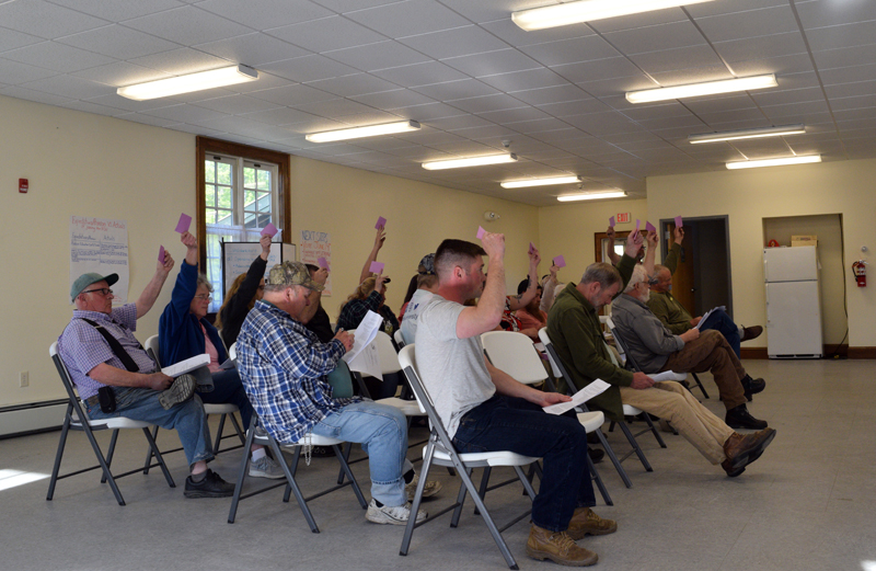 Dresden voters approve some minor changes to the town's land use and development ordinance to align with the Maine Uniform Building and Energy Code during a special town meeting on Tuesday, May 25. Voters also approved a new business license requirement and sale of the towns grader but rejected changes to the towns land use and development ordinance regarding mobile homes. (Evan Houk photo)