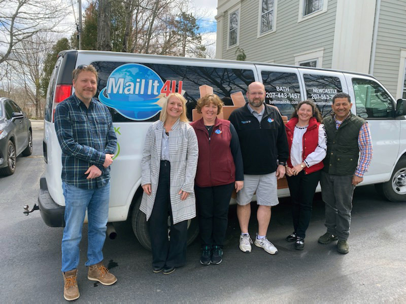 The Newcastle business Mail It 4 U is now under new ownership. From left: Daniel Baber and Juliet Kelsey-Holmes, of Maine Business Advisors LLC; former owners Lynne and Bob Plourde; and new owners Elisabeth Awamleh and Majed Awamleh. (Photo courtesy Lynne Plourde)