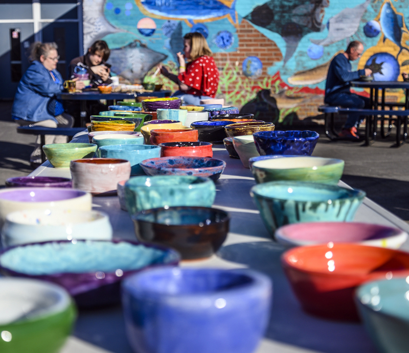 An array of colorfully glazed bowls welcome shoppers to the 20th annual Empty Bowl Supper at Medomak Valley High School in Waldoboro on Wednesday, May 18. (Bisi Cameron Yee photo)