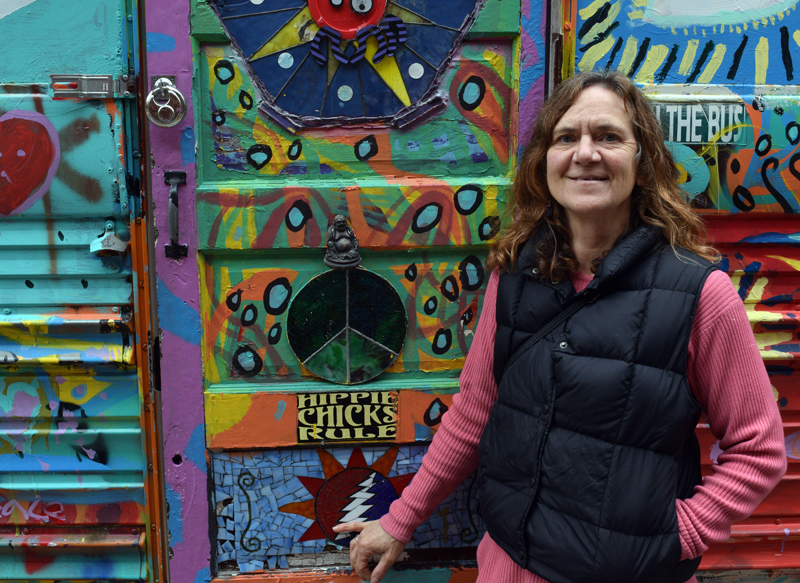 Cary Huggins stands in front of her popular Airbnb, "Hippy Bus," on April 26. Huggins offers various places to stay on her property on Westport Island and is working to restart a Trips with Kids bicycling program this year. (Evan Houk photo)