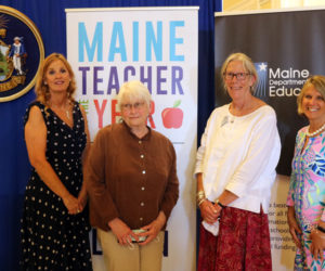 From left: Wiscasset Superintendent of Schools Dr. Terry Wood and Wiscasset Elementary School Literacy Interventionist Carol Adams, first grade teacher Trae Stover, and Principal Kathleen Pastore celebrate Stover being named Lincoln County Teacher of the Year on May 12. (Photo courtesy Maine Department of Education)