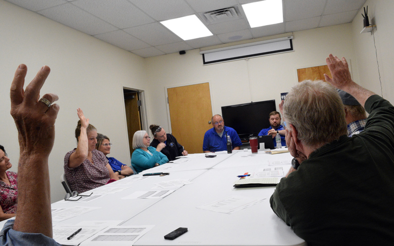 The Central Lincoln County Ambulance Service Board of Trustees votes to change the funding formula for the service to base founding towns contributions solely on property tax valuation on Monday, June 27. The board also voted to keep the formula in place for five years, starting in the next fiscal year. (Evan Houk photo)