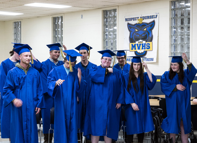 Midcoast Adult and Community Education graduates shift their tassels to the left at the completion of their graduation ceremony in Waldoboro on Thursday, June 9. (Bisi Cameron Yee photo)