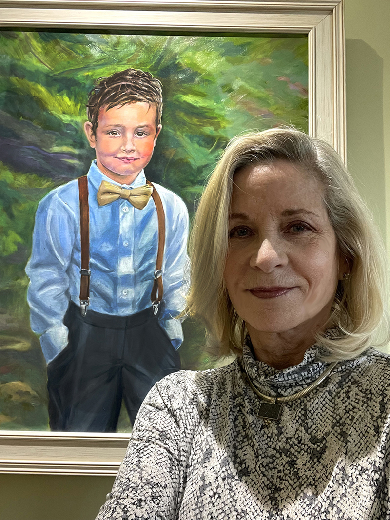 Damariscotta artist Ruth Monsell stands next to one of her recent oil paintings. (Photo courtesy of Ruth Monsell)