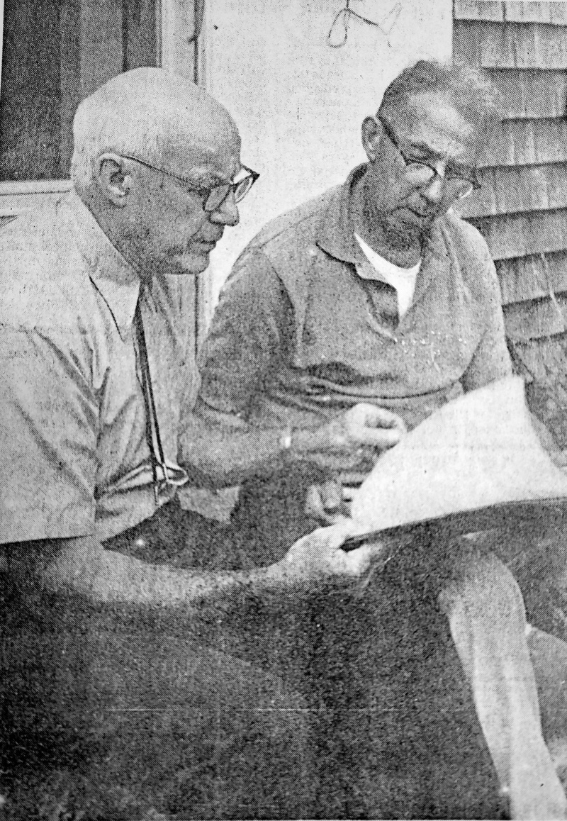 Harry Hagar Sr., right, a long-time employee of CMP, shows Dr. George Dow one of the logbooks formerly kept at the generating station at Damariscotta Mills. Hagar made the final entry on March 19, 1965 when ownership and management was transferred to Laurence J. Keddy. (Photo courtesy Nobleboro Historical Society)