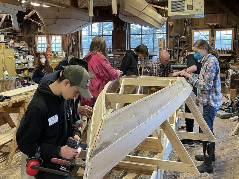 The South Bristol School eighth graders at the boat shop. (Photo courtesy South Bristol School staff)