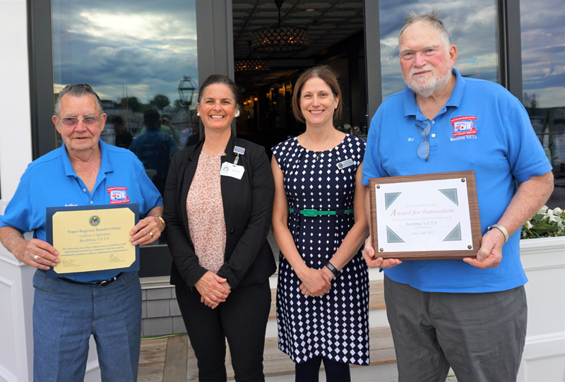 Boothbay V.E.T.S. received the 2022 Coulombe Center for Health Improvement Innovation Award at Coastal Prime in Boothbay Harbor June 14. Pictured are (from left): Arthur Richardson (V.E.T.S), Coulombe Center for Health Improvement Director AnniPat McKenney, Togus Executive Director Jennifer Bover and Ed Harmon, founder of V.E.T.S. Richardson is holding a certificate of appreciation presented that evening by the Veterans Administration. (Photo courtesy MaineHealth)
