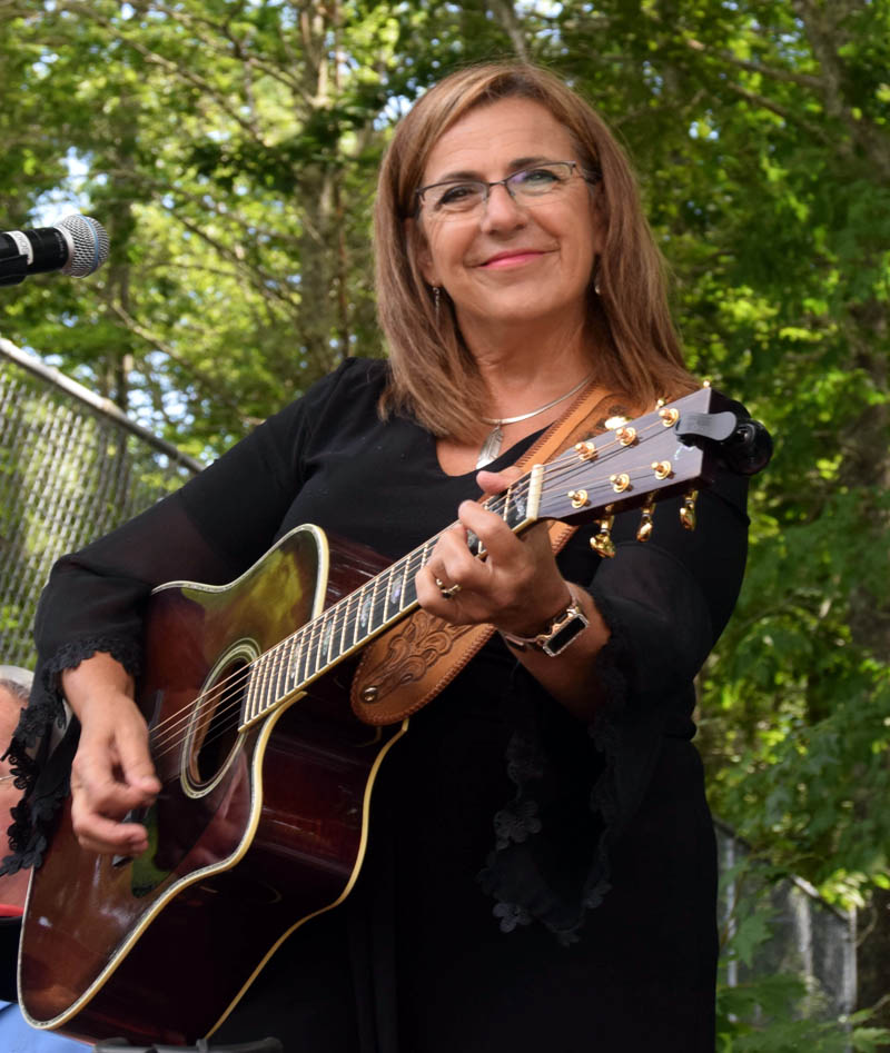 Debbie Myers smiles while performing during the 50th Annual North Nobleboro Day outside the North Nobleboro Community Hall. Myers, an award winning country singer, confirmed she plans to return for North Nobleboro Day 2023. (Alec Welsh photo)