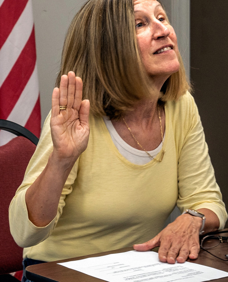 Tina Streker takes her oath of office during the the Nobleboro Select Board meeting on Wednesday, Aug. 10. The board unanimously appointed Streker to the town's broadband committee. (Bisi Cameron Yee photo)