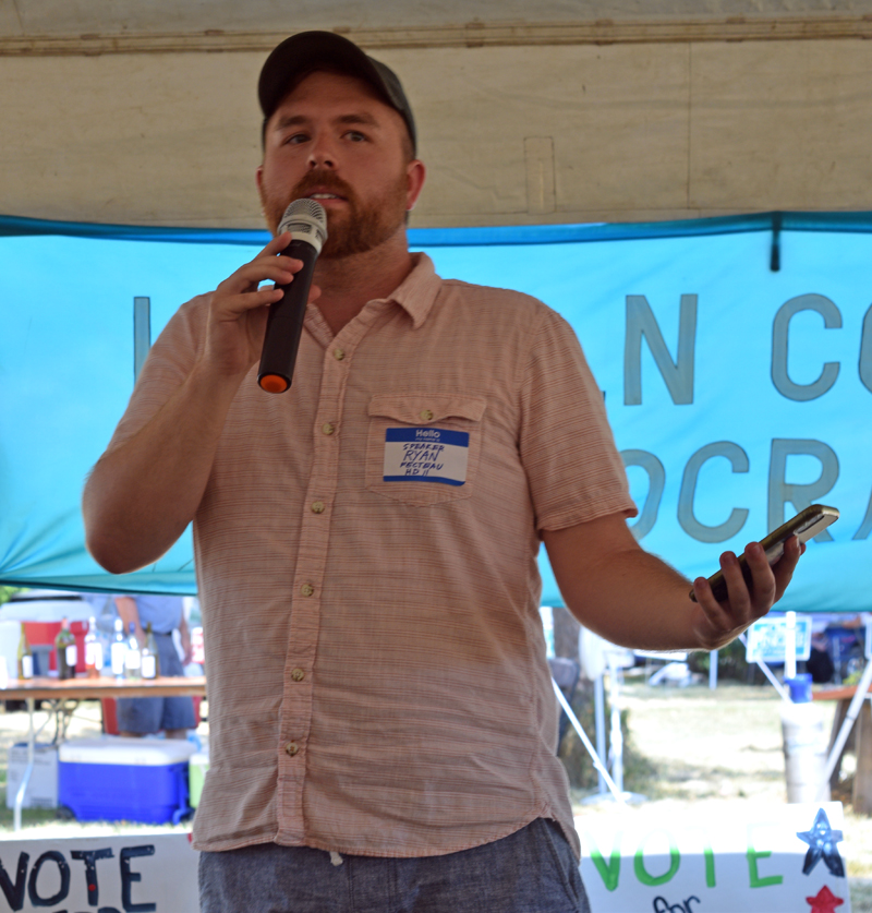 Speaker of the House Ryan Fecteau (D-Biddeford) outlines the accomplishments of the Democratic-controlled legislature over the past few years during the Lincoln County Democratic Committees annual Family Fun Day Lobster Bake at Cider Hill Farm in Waldoboro on Sunday, Aug. 7. Thats the work we need to continue to build upon, he said. (Evan Houk photo)
