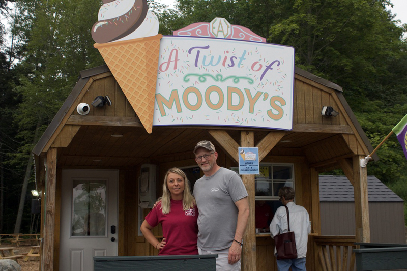 Jessica Beck (left) and Dan Beck stand in front of A Twist of Moodys on July 18. Jessica Beck is the manager of the ice cream stand, an offshoot of Moody's Diner, which Dan Beck owns. (Iris Pope photo)