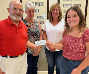 From the left: Damariscotta-Newcastle Lions Club President Tom Kronenberger and Lions scholarship committee members Angie Knott and Sherry Smith congratulate 2022 Arthur Doe Scholarship winner Emily Kelsey. (Photo courtesy Mark Potter)