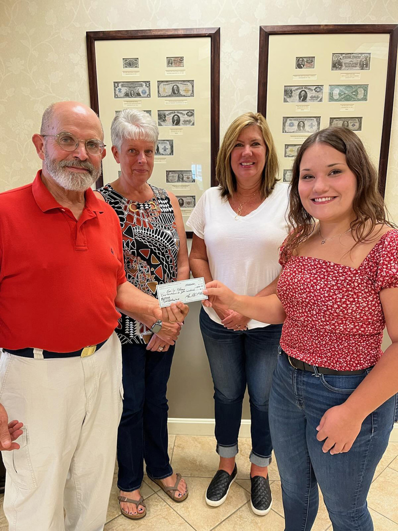 From the left: Damariscotta-Newcastle Lions Club President Tom Kronenberger and Lions scholarship committee members Angie Knott and Sherry Smith congratulate 2022 Arthur Doe Scholarship winner Emily Kelsey. (Photo courtesy Mark Potter)
