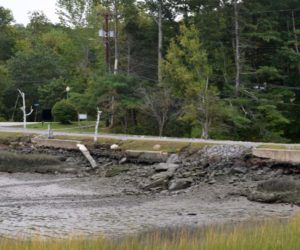 A section of Miles Street leading into LincolnHealth's Miles Campus in Damariscotta on Tuesday, Sept. 13. The retaining wall, which abuts a saltwater cove, will be rebuilt and new water delivery lines will be installed next spring. (Evan Houk photo)