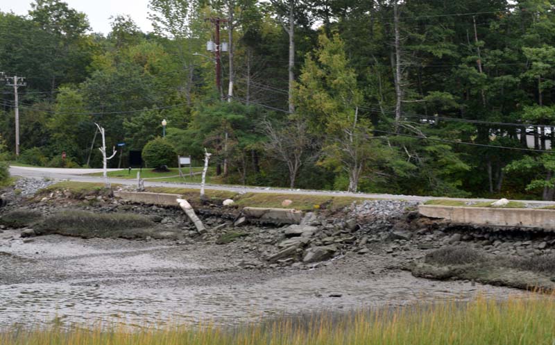 A section of Miles Street leading into LincolnHealth's Miles Campus in Damariscotta on Tuesday, Sept. 13. The retaining wall, which abuts a saltwater cove, will be rebuilt and new water delivery lines will be installed next spring. (Evan Houk photo)