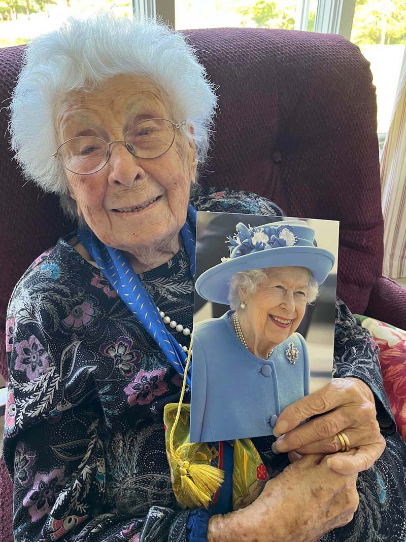 Damariscotta resident and Scotland native Gladys "Bobbie" Selverstone holds the signed 100th birthday card she received from Queen Elizabeth II, of the United Kingdom. Selverstone opened the card on Thursday, Sept. 8, the same day the queen died. (Photo courtesy Jane Selverstone)