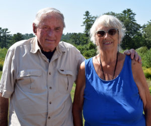 Weston and Sylvia Keene stand outside their Nobleboro homestead on Tuesday, Aug. 30. Good neighbors, the abundance and variety of nature, and the deep history and sense of place kept the Keenes attached to Nobleboro, Sylvia said. (Evan Houk photo)