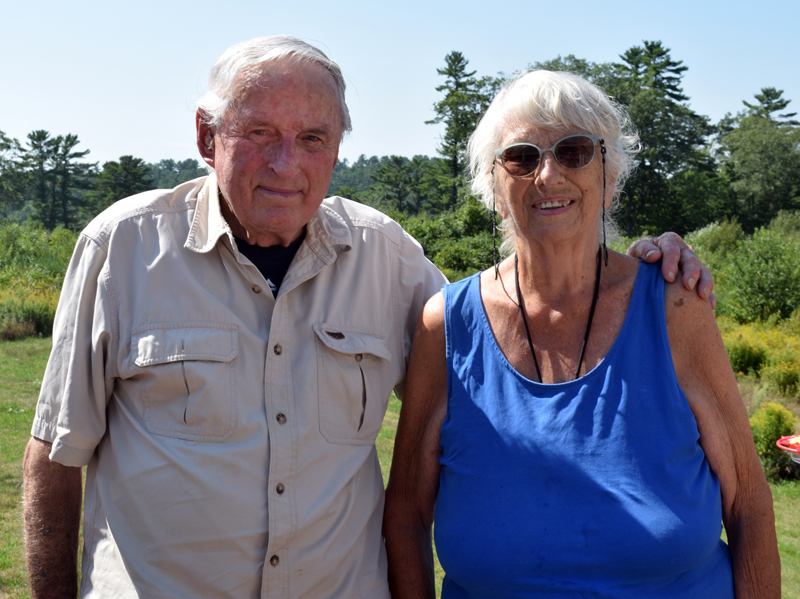 Weston and Sylvia Keene stand outside their Nobleboro homestead on Tuesday, Aug. 30. Good neighbors, the abundance and variety of nature, and the deep history and sense of place kept the Keenes attached to Nobleboro, Sylvia said. (Evan Houk photo)